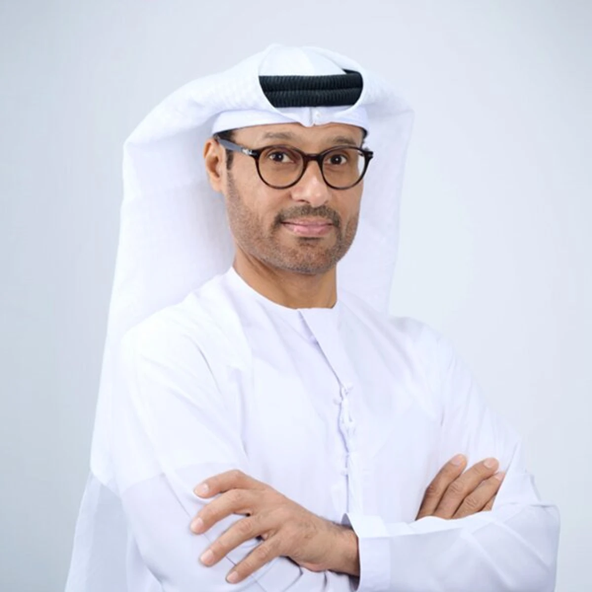 H.E. Dr. Mohamed Al Kuwaiti